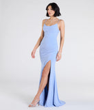 Step into the Prom 2025 dance in the Madison Cowl Neck Slit Glitter Formal Dress, a stunning blue prom dress designed to complement any theme with its timeless allure and statement-making style.