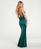 The Cassandra Lace-Up Wrap Mermaid Satin Formal Dress in hunter is a stunning green prom dress designed to capture attention with its fresh or bold color and effortlessly stylish silhouette.