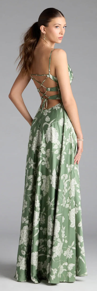 Turn heads at Prom 2025 in this sage green prom dress, where statement-making details meet the iconic style of the Robina Lace-Up A-Line Floral Satin Formal Dress.