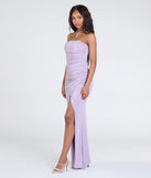 Make a bold statement in the Kaye Strapless Mermaid Slit Glitter Formal Dress in lavender, the perfect spring dress for weddings, cocktail hours, nights out, and/or seasonal celebrations.