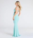 Turn heads at Prom 2025 in this blue prom dress, where statement-making details meet the iconic style of the Halie Open Back Mermaid Glitter Formal Dress.
