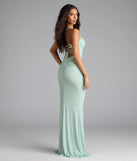 Own the spotlight in the Diane Lace-Up Slit Mermaid Glitter Formal Dress, a mint green formal dress crafted to deliver luxe style for summer weddings, Army Balls, or any special event.
