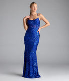 Turn heads at Prom 2025 in this royal blue prom dress, where statement-making details meet the iconic style of the Artemis Open Back Mermaid Sequin Formal Dress.