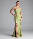 Turn heads at Prom 2025 in this sage green prom dress, where statement-making details meet the iconic style of the Mona Off-Shoulder Slit Mermaid Formal Dress.