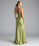 Turn heads at Prom 2025 in this sage green prom dress, where statement-making details meet the iconic style of the Mona Off-Shoulder Slit Mermaid Formal Dress.