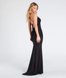 The Brigitta Glitter Lace-Up Mermaid Dress is a show-stopping black prom dress, offering a sleek, slimming silhouette that enhances your natural beauty for an unforgettable night.