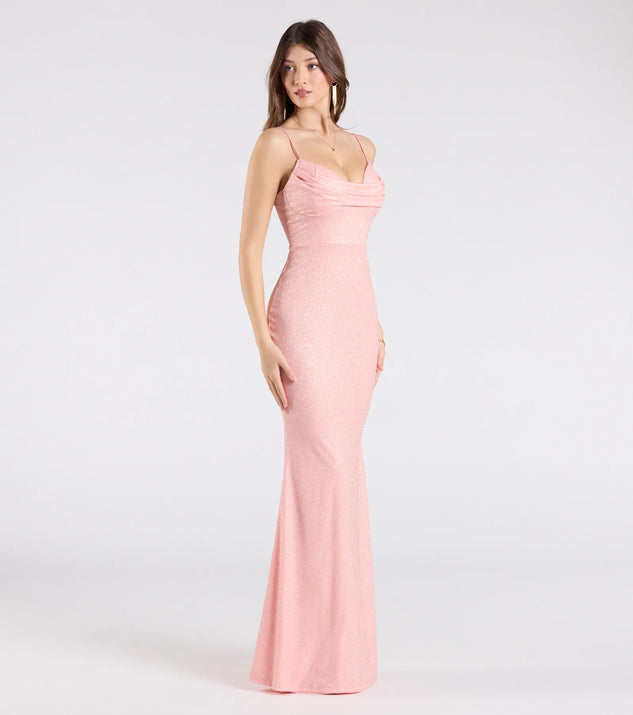 Make a bold statement in the Acacia Glitter Knit Cowl Neck Mermaid Dress in peach, the perfect spring dress for weddings, cocktail hours, nights out, and/or seasonal celebrations.