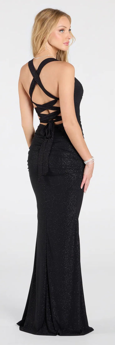 The Tatiana Lace-Up Mermaid Glitter Formal Dress is a show-stopping black prom dress, offering a sleek, slimming silhouette that enhances your natural beauty for an unforgettable night.