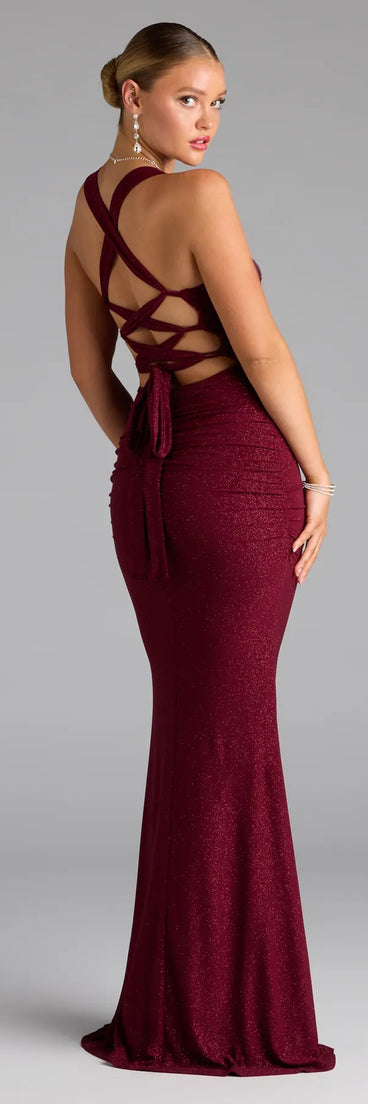 Own the spotlight in the Tatiana Lace-Up Mermaid Glitter Formal Dress, a wine formal dress crafted to deliver luxe style for autumn weddings, Military Balls, or any special event.