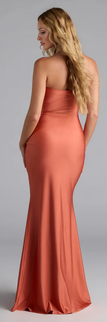 Own the spotlight in the Cheryl Strapless Slit Mermaid Formal Dress, a rust formal dress crafted to deliver luxe style for autumn weddings, Military Balls, or any special event.