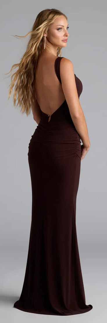 Own the spotlight in the Zooey Open Back Mermaid Formal Dress, a brown formal dress crafted to deliver luxe style for weddings, Military Balls, or Prom 2026.