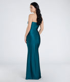 The Cheryl Strapless Slit Mermaid Formal Dress in hunter is a stunning green prom dress designed to capture attention with its fresh or bold color and effortlessly stylish silhouette.