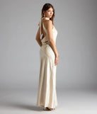 Own the spotlight in the Andie Halter Open Back Slit Satin Formal Dress, a gold formal dress crafted to deliver luxe style for summer weddings, Army Balls, or any special event.