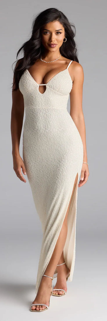 The Aiza V-Neck Slit Beaded Formal Dress is your new go-to ivory dress—effortless, versatile, and made to update your fall style in seconds.