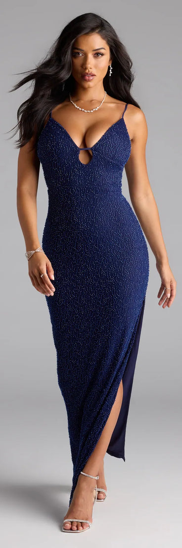 Feel ready for every dance floor moment or feed-worthy reel in the Aiza V-Neck Slit Beaded Formal Dress, a navy blue homecoming dress designed to own your moment.