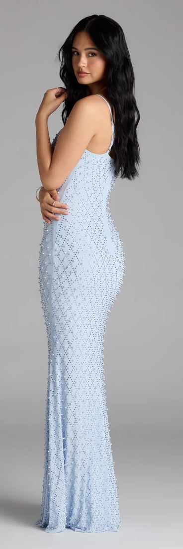 Own the spotlight in the Elliot Rhinestone And Pearl Mesh Mermaid Dress, a light blue formal dress crafted to deliver luxe style for autumn weddings, Military Balls, or any special event.