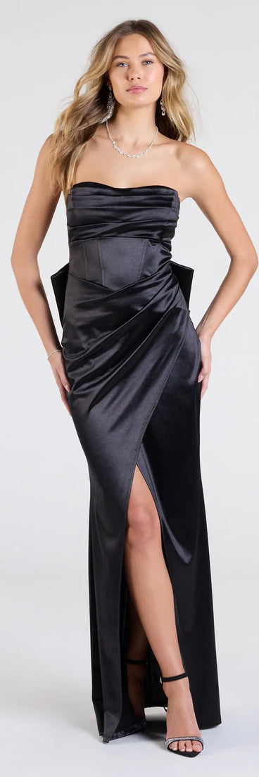 Own the spotlight in the Mackenzie Strapless Corset Bow Satin Formal Dress, a black formal dress crafted to deliver luxe style for autumn weddings, Military Balls, or any special event.