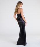 Flaunt your silhouette in the tight Mackenzie Strapless Corset Bow Satin Formal Dress in black, a bodycon dress that empowers your look with bold style and effortless edge.