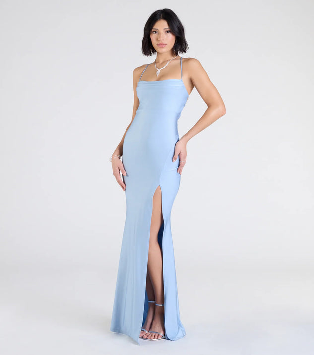 Step into the Prom 2025 dance in the Delia Formal Cowl Neck Long Dress in light blue, a stunning blue prom dress designed to complement any theme with its timeless allure and statement-making style.