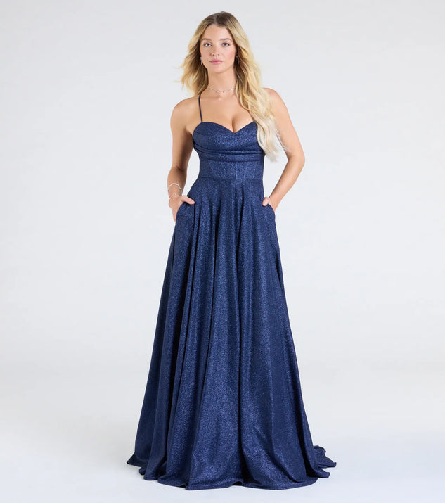 Make the big day unforgettable with the Hattie Glitter Corset Lace-Up Ball Gown, a gorgeous navy blue bridesmaid dress that balances elegance and affordability.