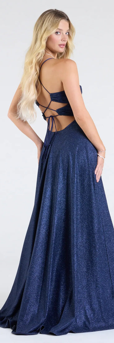 Step into the Prom 2025 dance in the Hattie Glitter Corset Lace-Up Ball Gown in navy, a stunning blue prom dress designed to complement any theme with its timeless allure and statement-making style.