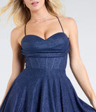 Make a bold statement in the Hattie Glitter Corset Lace-Up Ball Gown in navy blue, the perfect spring dress for weddings, cocktail hours, nights out, and/or seasonal celebrations.