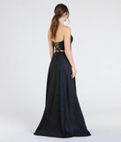 The Charlotte Strapless Corset A-Line Glitter Formal Dress is a show-stopping black prom dress, offering a sleek, slimming silhouette that enhances your natural beauty for an unforgettable night.