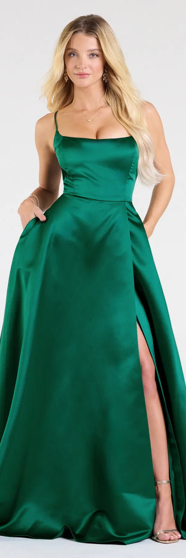 Own the spotlight in the Brittany Lace-Up Slit A-Line Satin Formal Dress, a hunter green formal dress crafted to deliver luxe style for autumn weddings, Military Balls, or any special event.