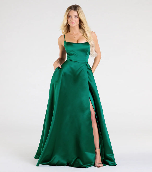 The Brittany Lace-Up Slit A-Line Satin Formal Dress in hunter is a stunning green prom dress designed to capture attention with its fresh or bold color and effortlessly stylish silhouette.
