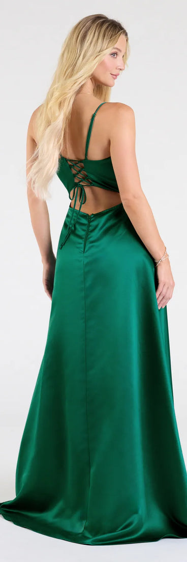 The Brittany Lace-Up Slit A-Line Satin Formal Dress in hunter is a stunning green prom dress designed to capture attention with its fresh or bold color and effortlessly stylish silhouette.