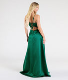 The Brittany Lace-Up Slit A-Line Satin Formal Dress in hunter is a stunning green prom dress designed to capture attention with its fresh or bold color and effortlessly stylish silhouette.