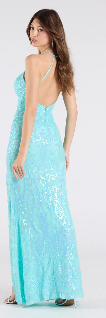 The Kensley Open Back Slit Sequin Formal Dress in turquoise is a stunning green prom dress designed to capture attention with its fresh or bold color and effortlessly stylish silhouette.
