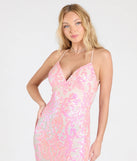 Turn heads at Prom 2025 in this pink prom dress, where statement-making details meet the iconic style of the Kensley Open Back Slit Sequin Formal Dress.