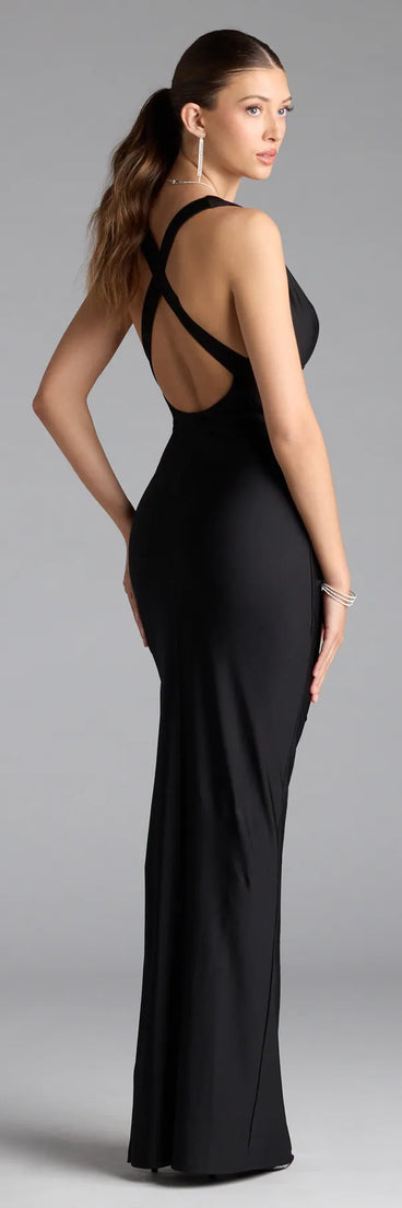 Turn heads at Prom 2025 in this black prom dress, where statement-making details meet the iconic style of the Jenn V-Neck Strappy Back Slit Long Formal Dress.