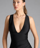 Turn heads at Prom 2025 in this black prom dress, where statement-making details meet the iconic style of the Jenn V-Neck Strappy Back Slit Long Formal Dress.