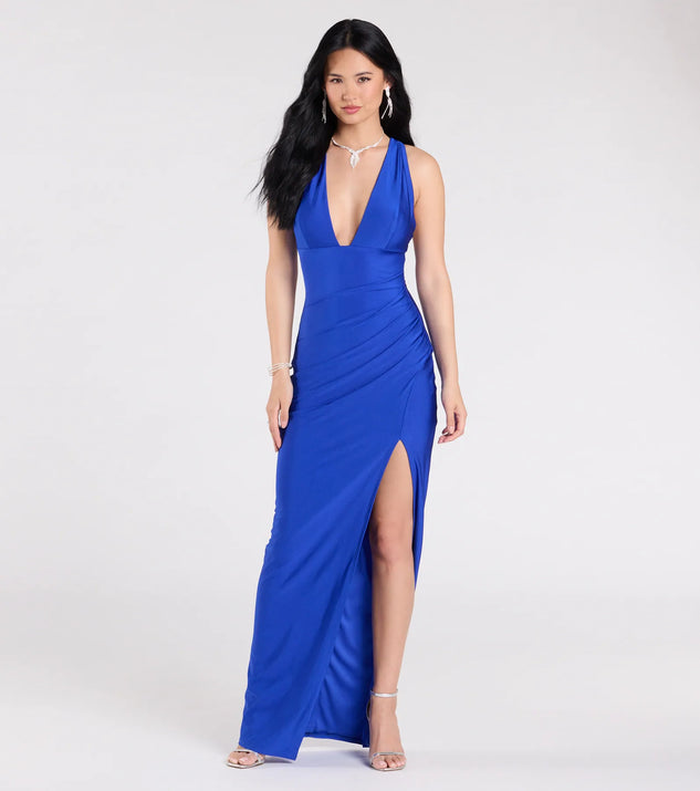 Make a bold statement in the Jenn V-Neck Strappy Back Slit Long Formal Dress in royal blue, the perfect spring dress for weddings, cocktail hours, nights out, and/or seasonal celebrations.