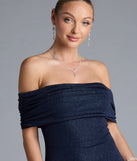 Turn heads at Prom 2025 in this navy blue prom dress, where statement-making details meet the iconic style of the Nastassia Off-The-Shoulder Mermaid Glitter Formal Dress.