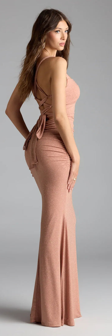 Own the spotlight in the Tatiana Lace-Up Mermaid Glitter Formal Dress, a camel brown formal dress crafted to deliver luxe style for autumn weddings, Military Balls, or any special event.