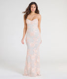 Turn heads at Prom 2025 in this blush prom dress, where statement-making details meet the iconic style of the Nicollet Lace-Up Mermaid Floral Formal Dress.