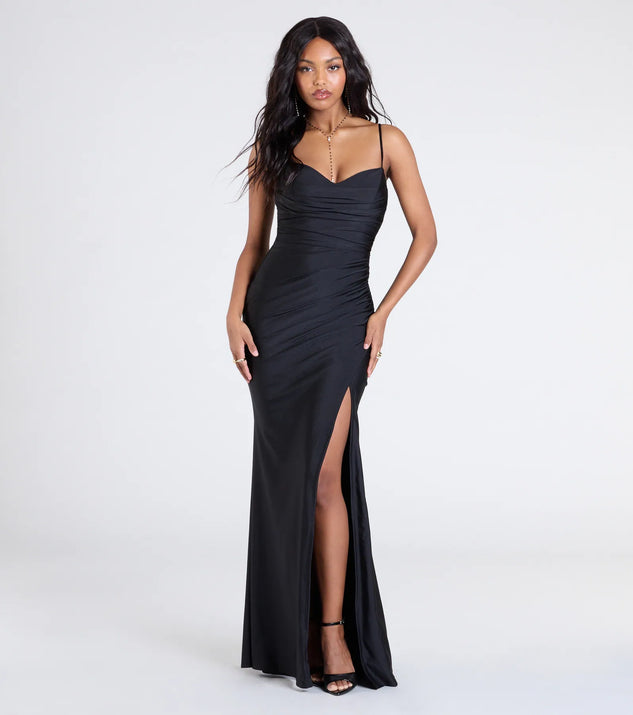 Make a bold statement in the Marcie Cowl Neck Slit Mermaid Formal Dress in black, the perfect spring dress for weddings, cocktail hours, nights out, and/or seasonal celebrations.