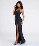 Make a bold statement in the Marcie Cowl Neck Slit Mermaid Formal Dress in black, the perfect spring dress for weddings, cocktail hours, nights out, and/or seasonal celebrations.