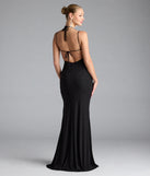 Turn heads at Prom 2025 in this black prom dress, where statement-making details meet the iconic style of the Ariadna Strappy Open Back Slit Glitter Formal Dress.