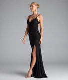 Turn heads at Prom 2025 in this black prom dress, where statement-making details meet the iconic style of the Ariadna Strappy Open Back Slit Glitter Formal Dress.