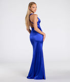 Step into the Prom 2025 dance in the Judy Open Back Slit Mermaid Satin Formal Dress in royal, a stunning blue prom dress designed to complement any theme with its timeless allure and statement-making style.