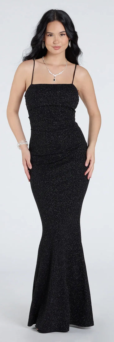 Keep it classic with the Wendy Sleeveless Mermaid Glitter Formal Dress, a feed-worthy pick from Windsor's black homecoming dress collection made to stop their scroll from pictures to the dance floor.