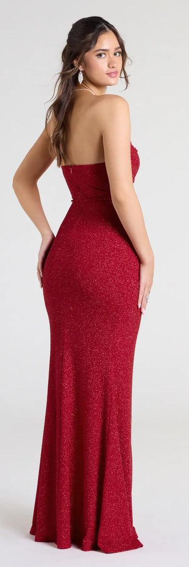 Turn heads at Prom 2025 in this red prom dress, where statement-making details meet the iconic style of the Perry Glitter Knit Wrap Slit Mermaid Dress.