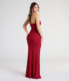 Turn heads at Prom 2025 in this red prom dress, where statement-making details meet the iconic style of the Perry Glitter Knit Wrap Slit Mermaid Dress.