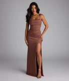 Own the spotlight in the Catherine Open Back Mermaid Glitter Formal Dress, a brown formal dress crafted to deliver luxe style for summer weddings, Army Balls, or any special event.