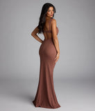 Own the spotlight in the Catherine Open Back Mermaid Glitter Formal Dress, a brown formal dress crafted to deliver luxe style for summer weddings, Army Balls, or any special event.