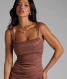 Own the spotlight in the Catherine Open Back Mermaid Glitter Formal Dress, a brown formal dress crafted to deliver luxe style for summer weddings, Army Balls, or any special event.